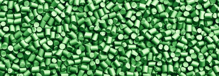 kleine grüne Kunststoffteilchen