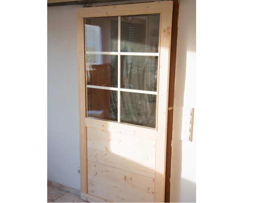 Holzschiebetür mit Glaseinsatz