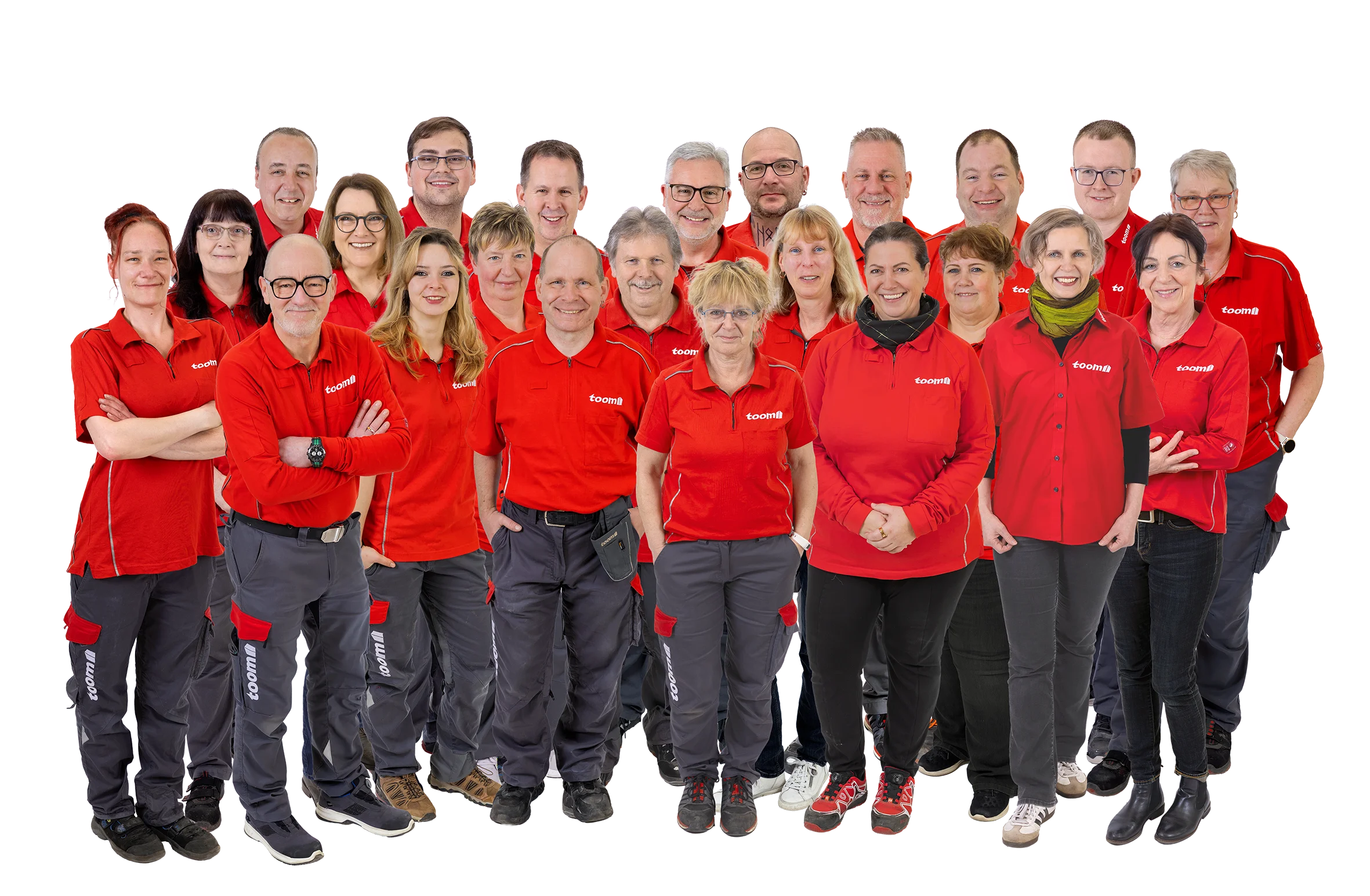Gruppenfoto eines Teams in einheitlicher roter und grauer Arbeitskleidung.