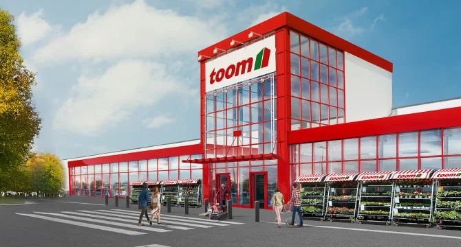 Außenansicht eines modernen Baumarktes mit Menschen und Pflanzenverkauf.