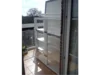 Kleines Gewächshaus auf einem Balkon
