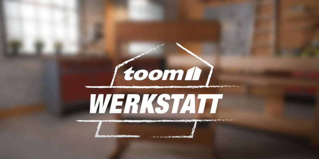 Unscharfer Hintergrund, Logo "toom Werkstatt"
