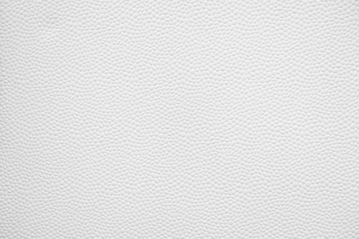 Weiße strukturierte Tapete