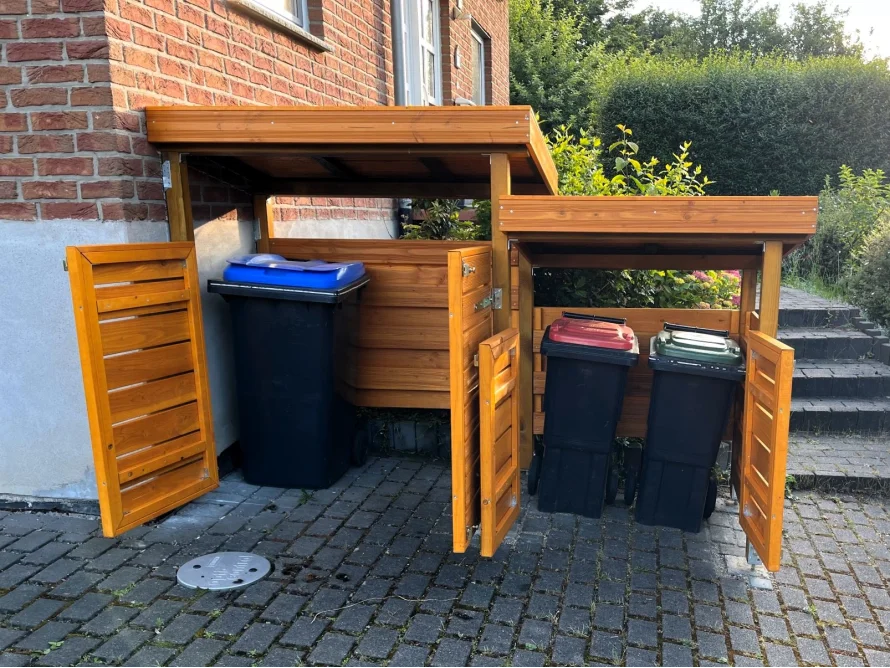 Holzver verkleidet Mülltonnen