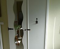Garderobe + Schrank in Tür