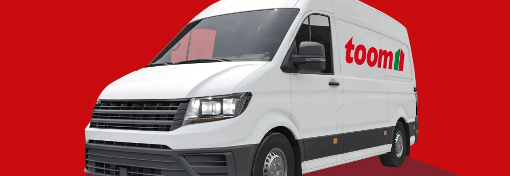 Weißer Transporter vor rotem Hintergrund