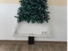 Halterung für einen Weihnachtsbaum an der Wand