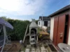 Garten mit Grillplatz und Gartenhaus