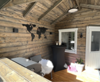 Überdachte Terrasse mit Grill