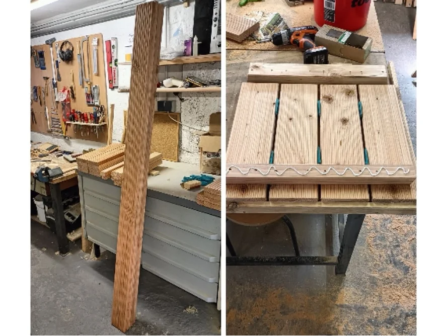 Holzbalken und Akkuschrauber auf Werkbank