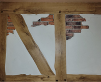 Fachwerkwand mit Ziegelsteinen