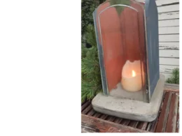 Windlicht mit brennender Kerze