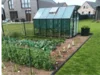 Gemüsegarten mit Gewächshaus