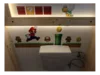 Toilette mit Super Mario Dekoration