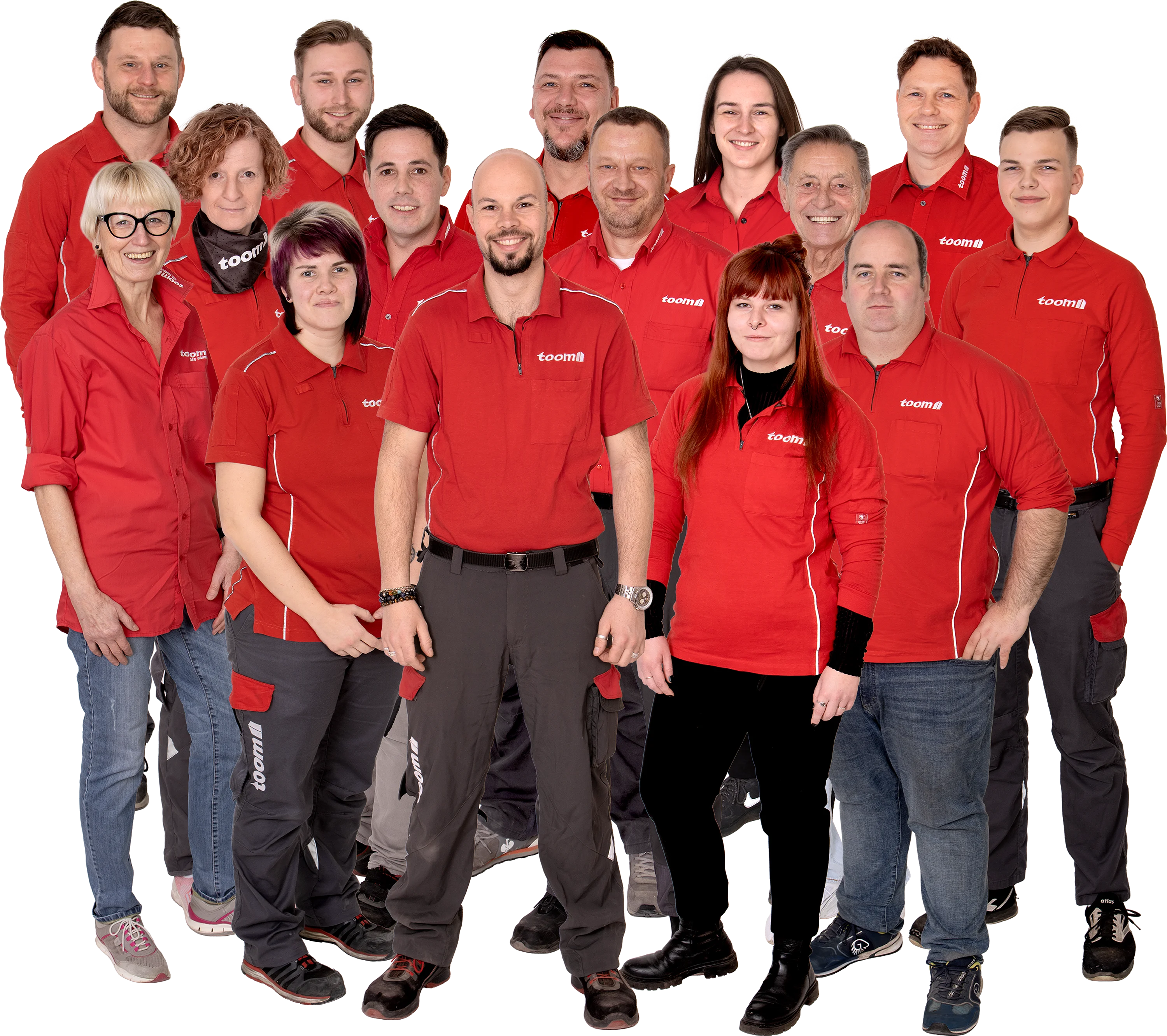 Gruppenfoto eines Teams in einheitlicher roter Arbeitskleidung.