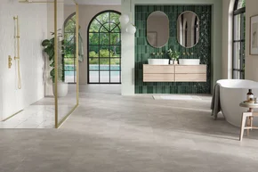 Modernes Badezimmer mit grauen Fliesen