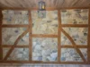 Wand mit Steinwand und Holzbalken
