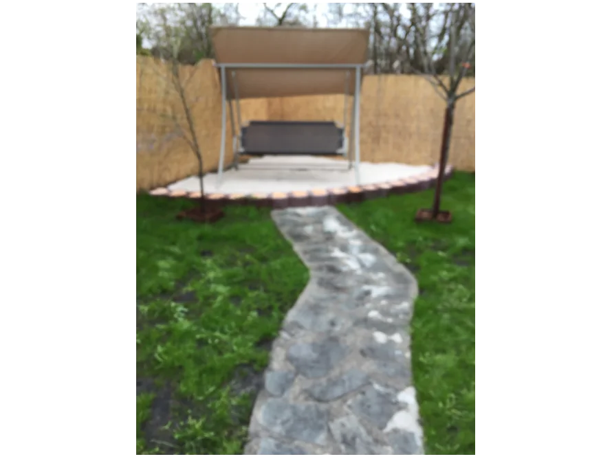 Garten mit Hollywoodschaukel