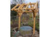 Brunnen mit Holzüberbau