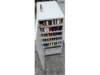 Offener Nähschrank mit Garnrollen