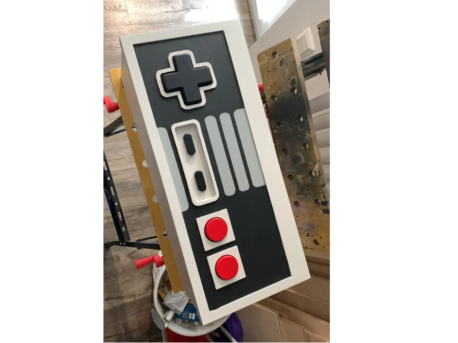 Spielkonsolen-förmiges Regal