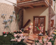 Puppenhaus mit Terrasse und Garten