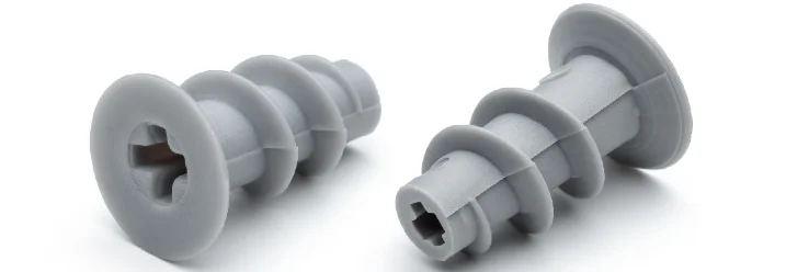 Zwei graue Spiraldübel