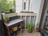 Balkon mit Blumen und Kräutern