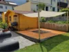 Gartenhaus mit Sonnensegel