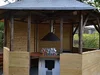 Holzpavillon mit Grillkamin