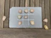 Tic-Tac-Toe Spiel mit Steinen