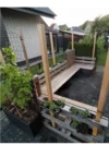 Gartenlounge aus Paletten mit Pflanzen