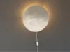 Leuchtende Mond-Wandlampe mit Gesicht