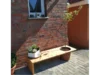 Holzbank mit integriertem Blumentopf