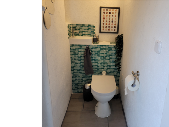 Toilette mit Waschbecken