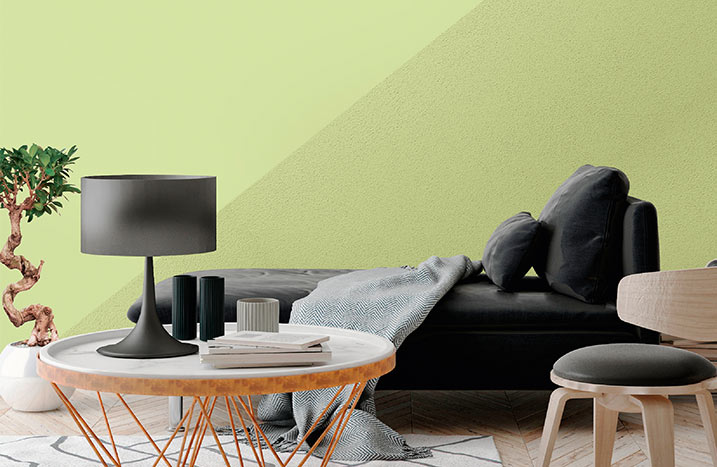 Wohnzimmer mit grüner Wand