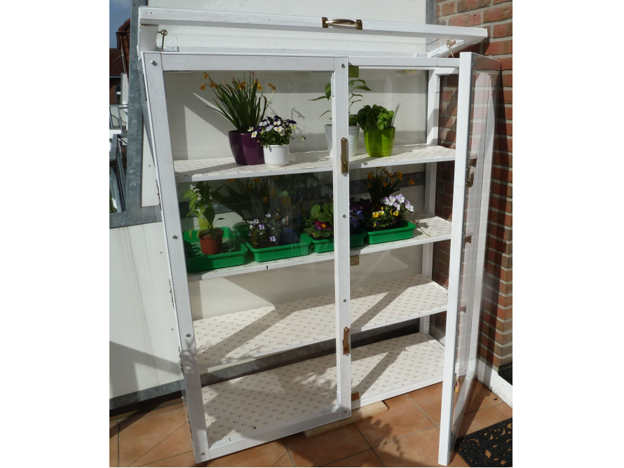 Weißer Pflanzenschrank mit Glastüren