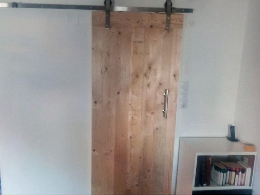 Holzschiebetür mit Schiefermechanismus