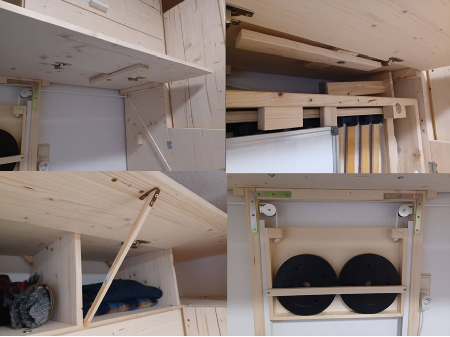 Holzkonstruktion mit Scharnieren und Flaschenzügen